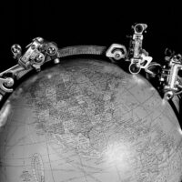 Globe with bike parts representing where they shipped from